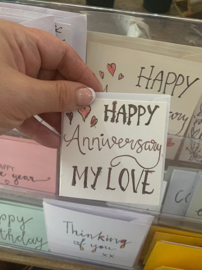 Happy anniversary card and flowers