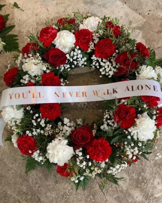 Red and white floral tribute