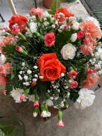 Colourful female grave posy