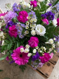 Colourful female grave posy