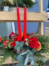 Red two candle centre piece arrangement